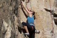 Woman rock climbing.